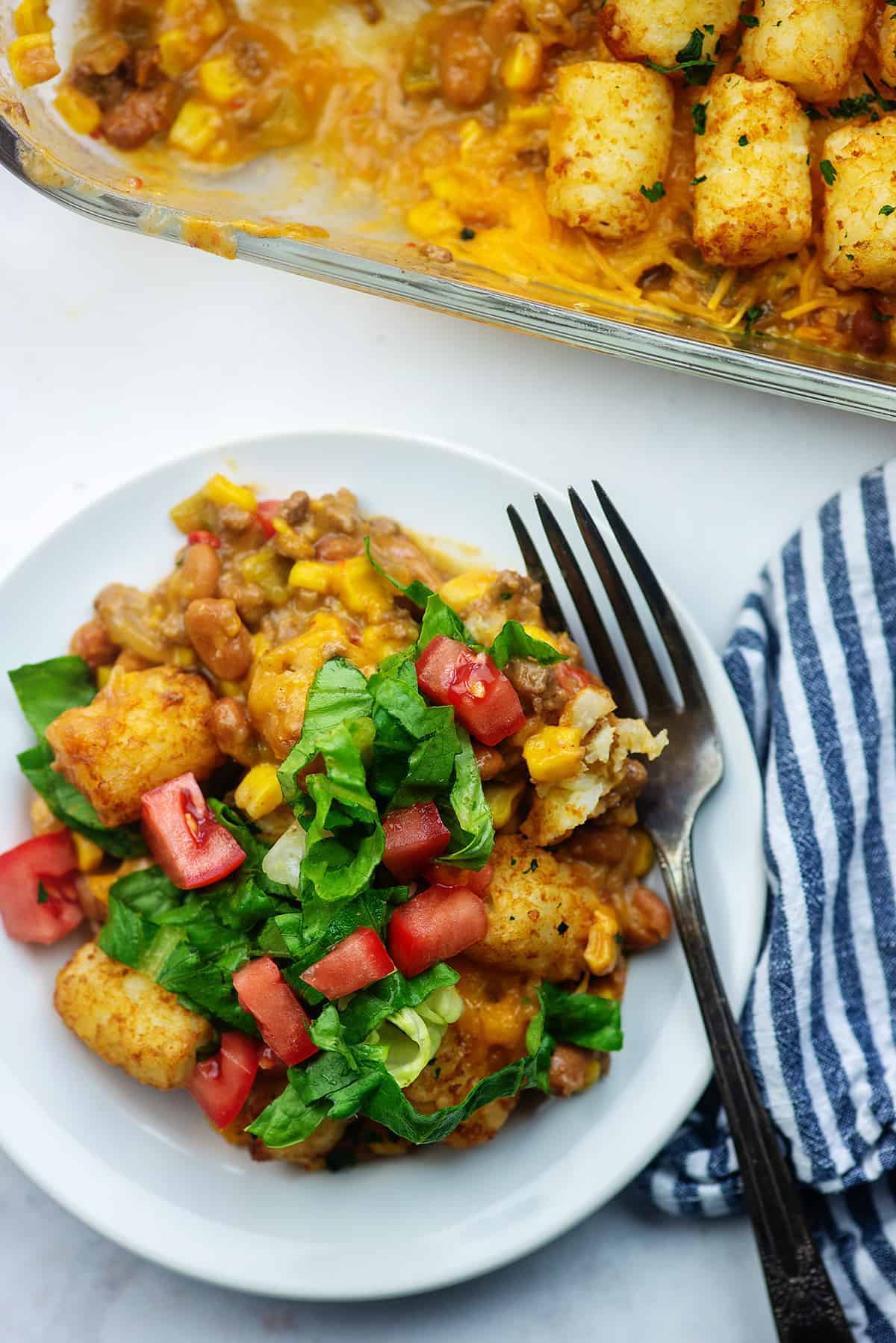 mexican tater tot casserole on white plate
