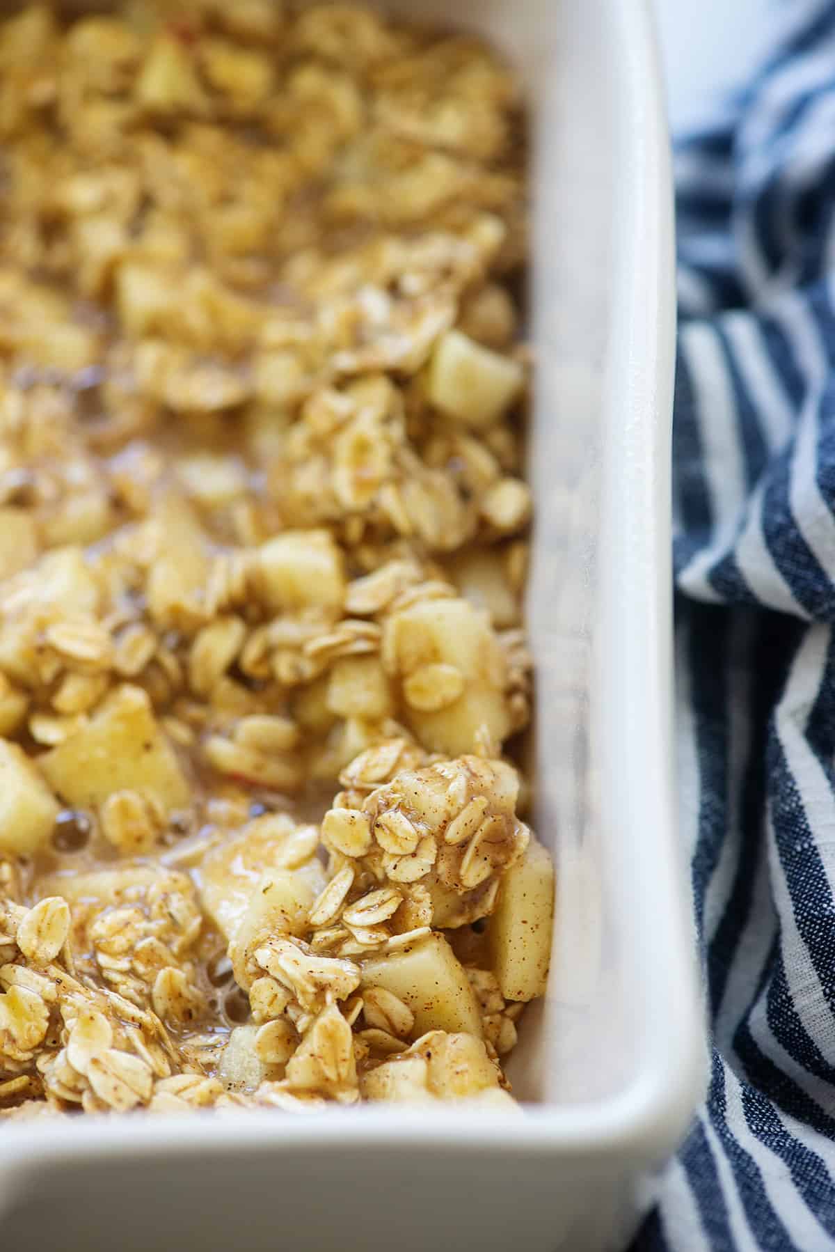 apple cinnamon oatmeal in white baking dish