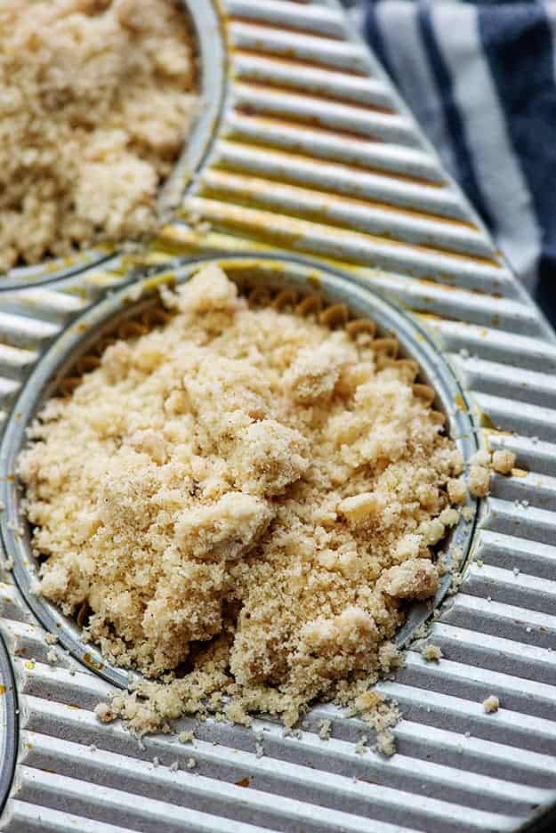 streusel topped muffins in muffin tin