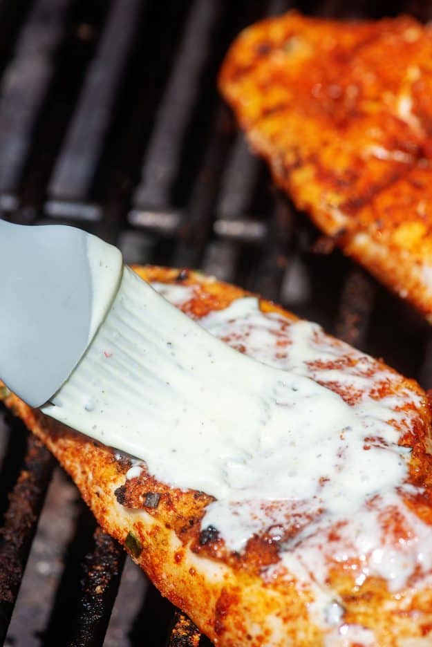 white sauce brushed on chicken breasts.