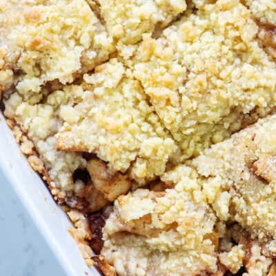 apple crumb bars in white dish