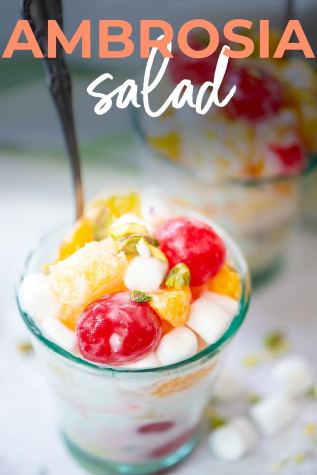 ambrosia salad in glass with text for Pinterest.