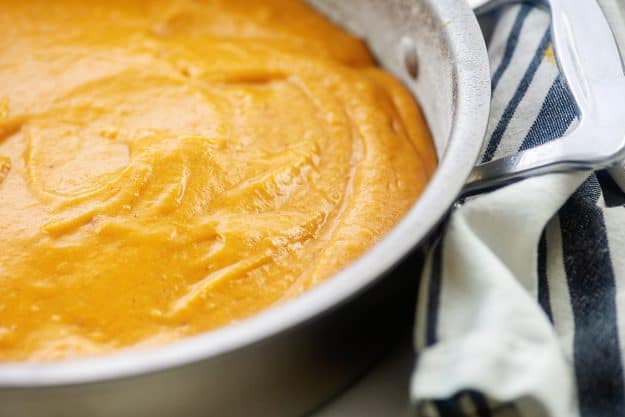 pumpkin cake batter in cake pan.