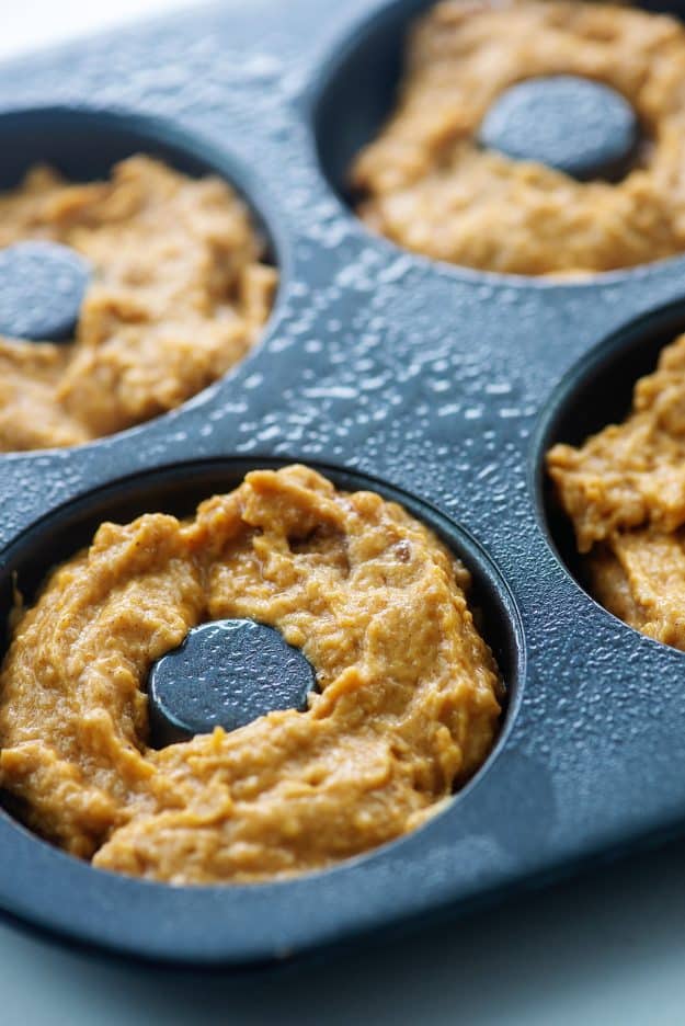 pumpkin donut batter in donut pan