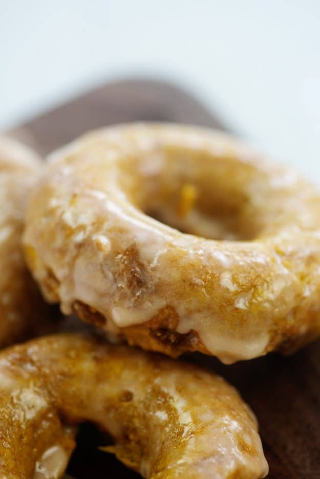 pile of donuts on cutting board