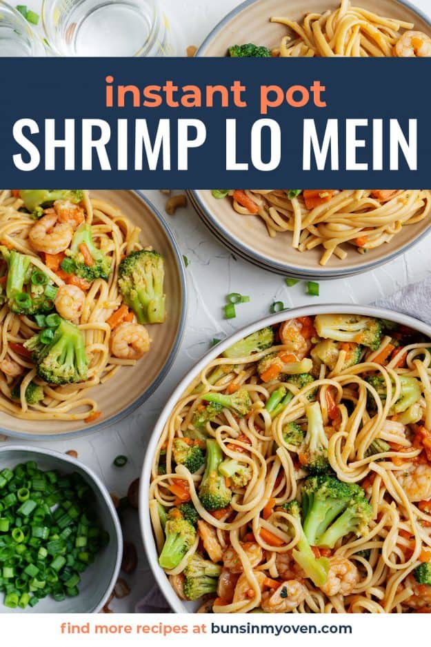 Shrimp lo mein in white bowls.
