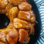 monkey bread on black plate.