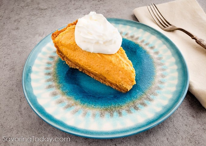 pumpkin dream pie on blue plate.