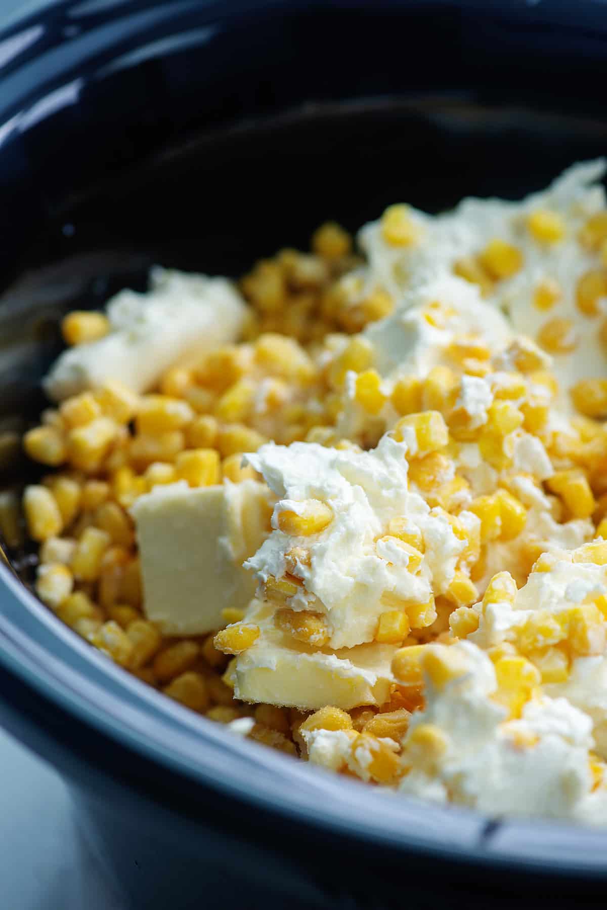 cream cheese corn ingredients in crock pot.
