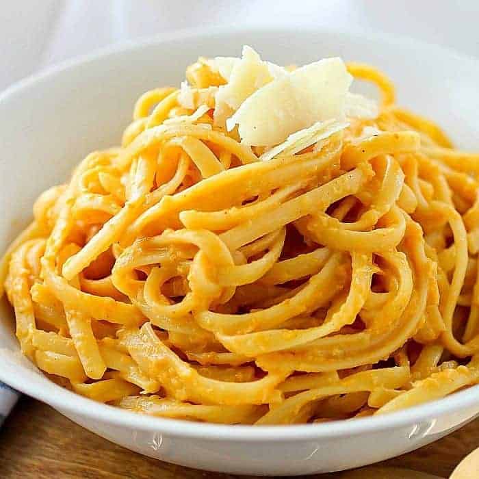pumpkin pasta in white bowl.
