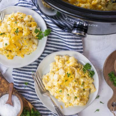 cheesy hashbrown casserole on plates.