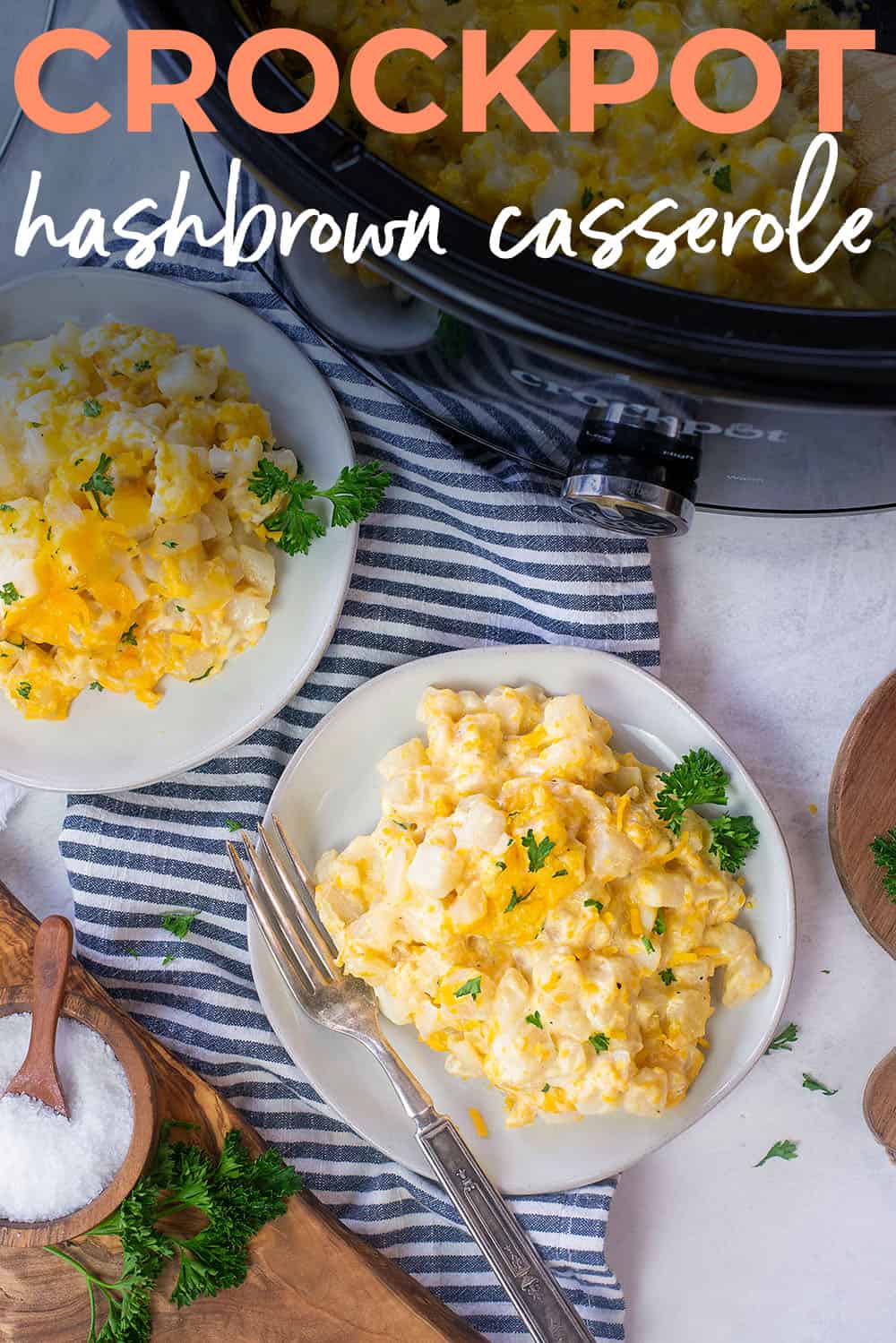 overhead view of crockpot hashbrown casserole on white plates.