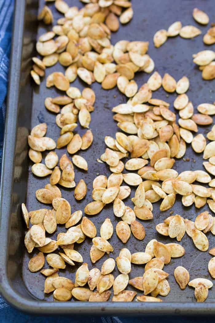 pumpkin seeds on sheet pan.