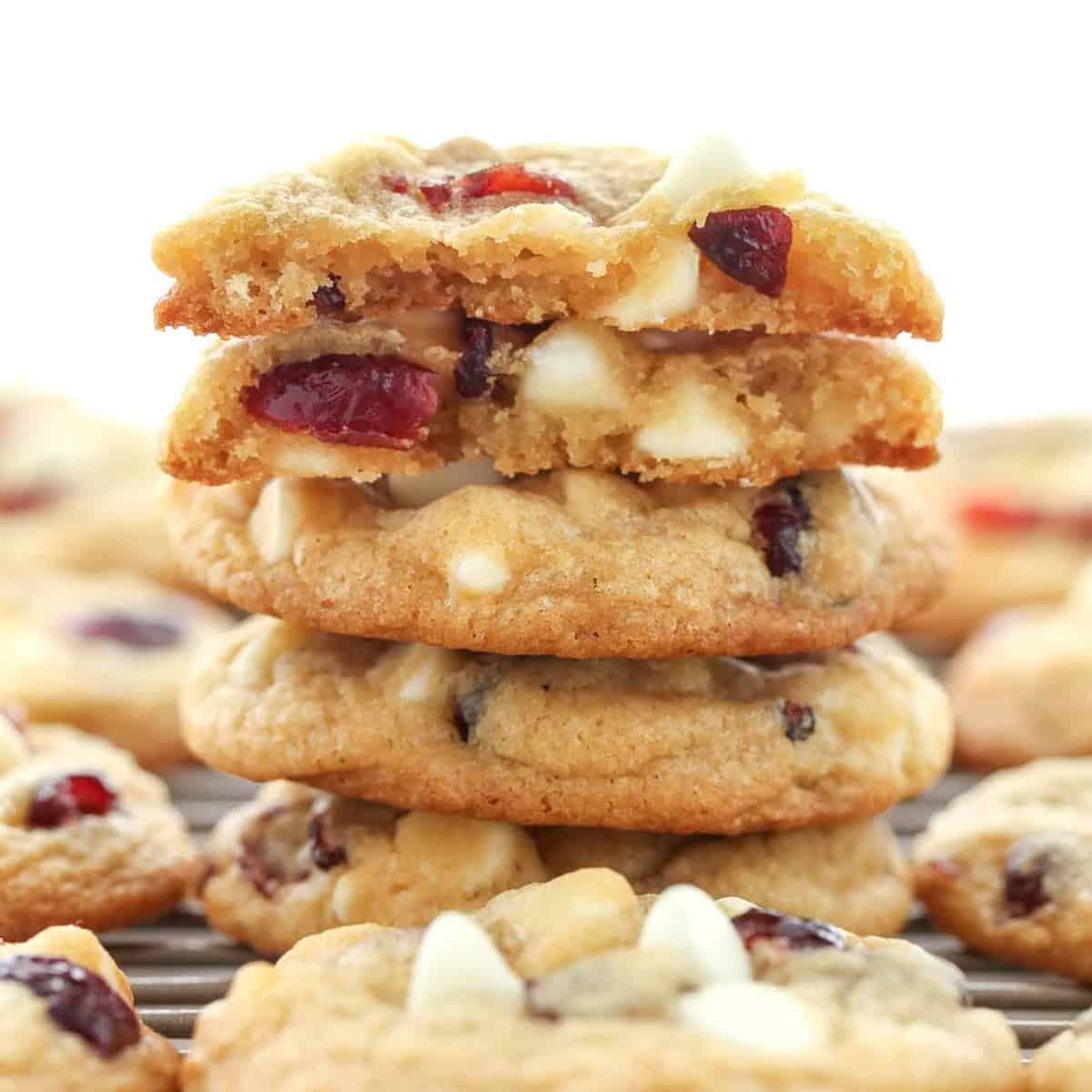 white cranberry cookies in a stack.