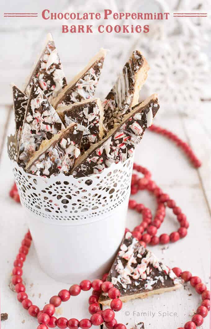 peppermint bark cookies in white cup.