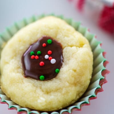 chocolate thumbprint cookie in red and green muffin liners.