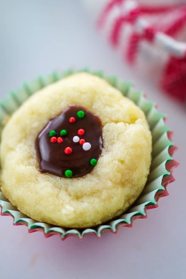 chocolate thumbprint cookie in red and green muffin liners.