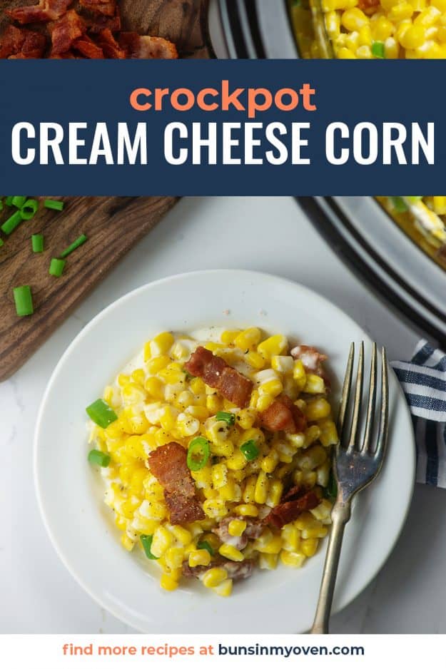 creamed corn on white plate.