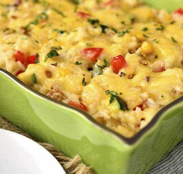 vegetable turkey and rice casserole in green dish.