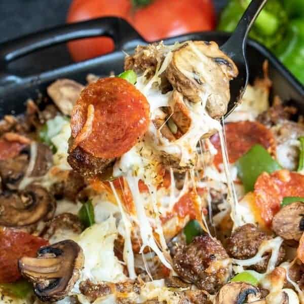 low carb pizza casserole on spoon.