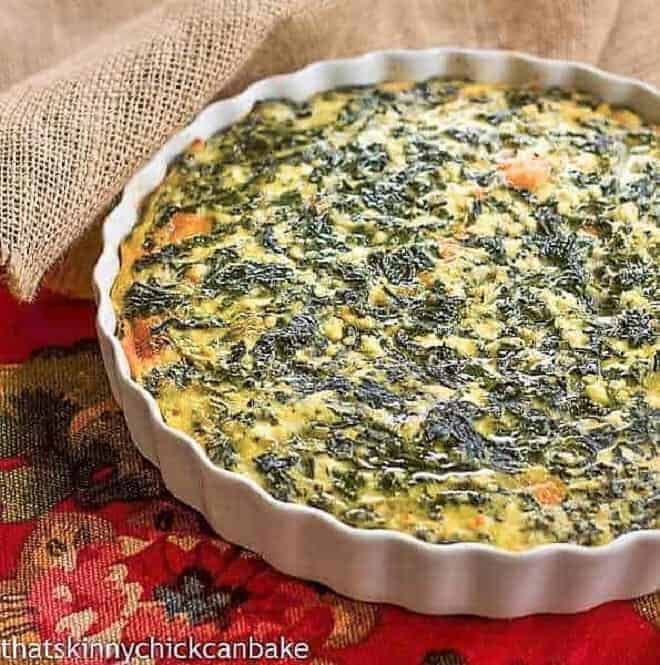 spinach souffle in white dish.