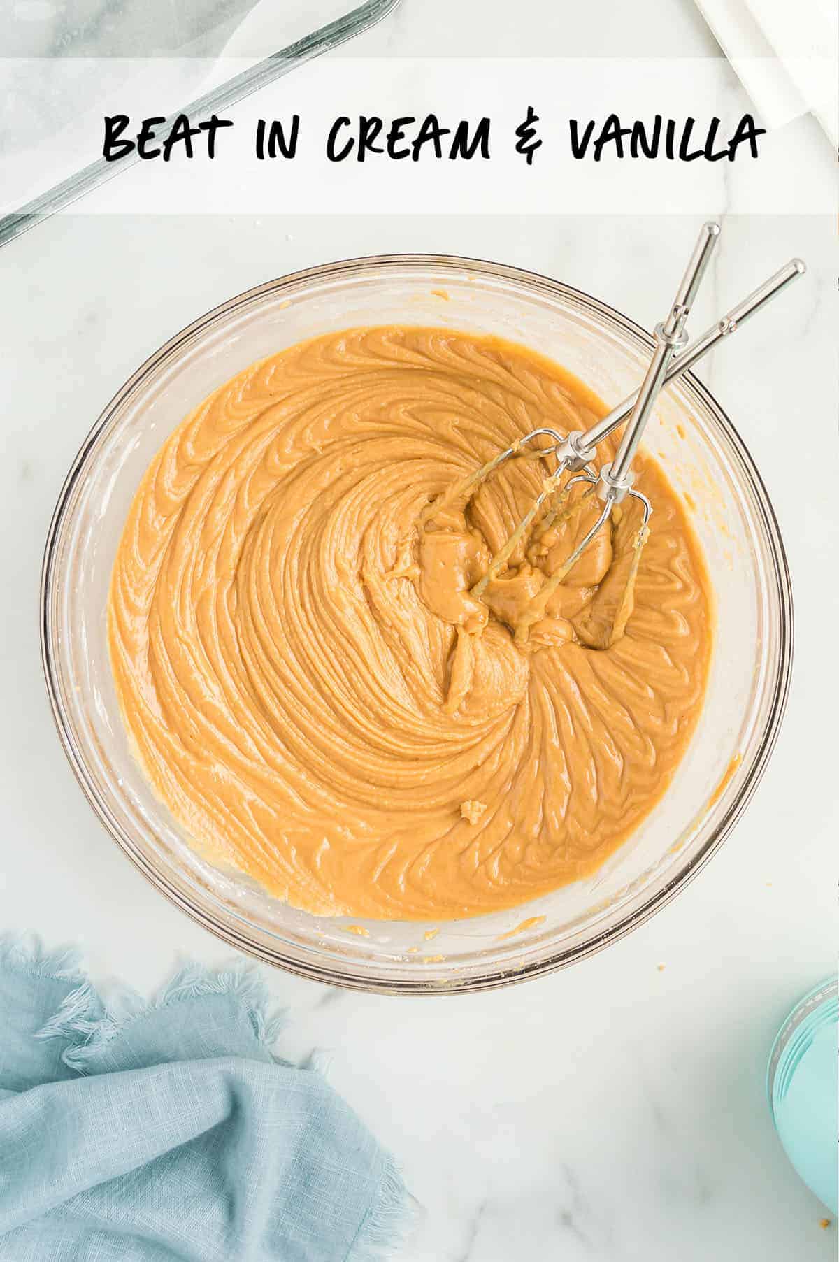 easy peanut butter fudge ingredients mixed together in glass bowl.