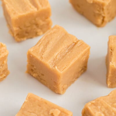 smooth and creamy peanut butter fudge on white countertop.
