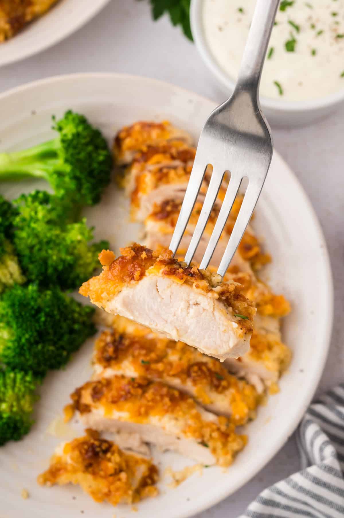 Sliced ranch chicken recipe on fork.