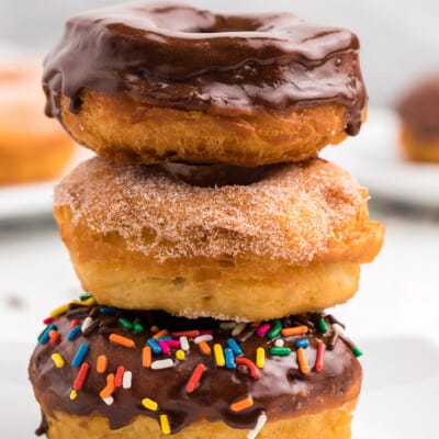 stack of canned biscuit donuts.