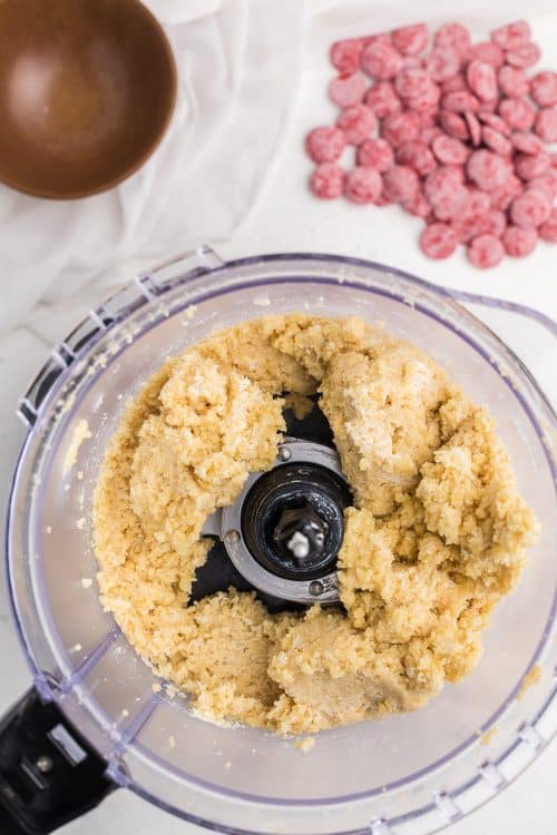 sugar cookie ball mixture in food processor.