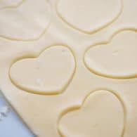 pie crust cut into heart shapes.