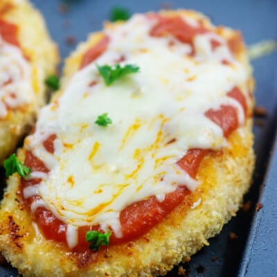 oven baked healthy chicken Parmesan on sheet pan.