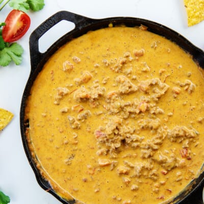 Rotel Cheese Dip recipe in cast iron skillet.