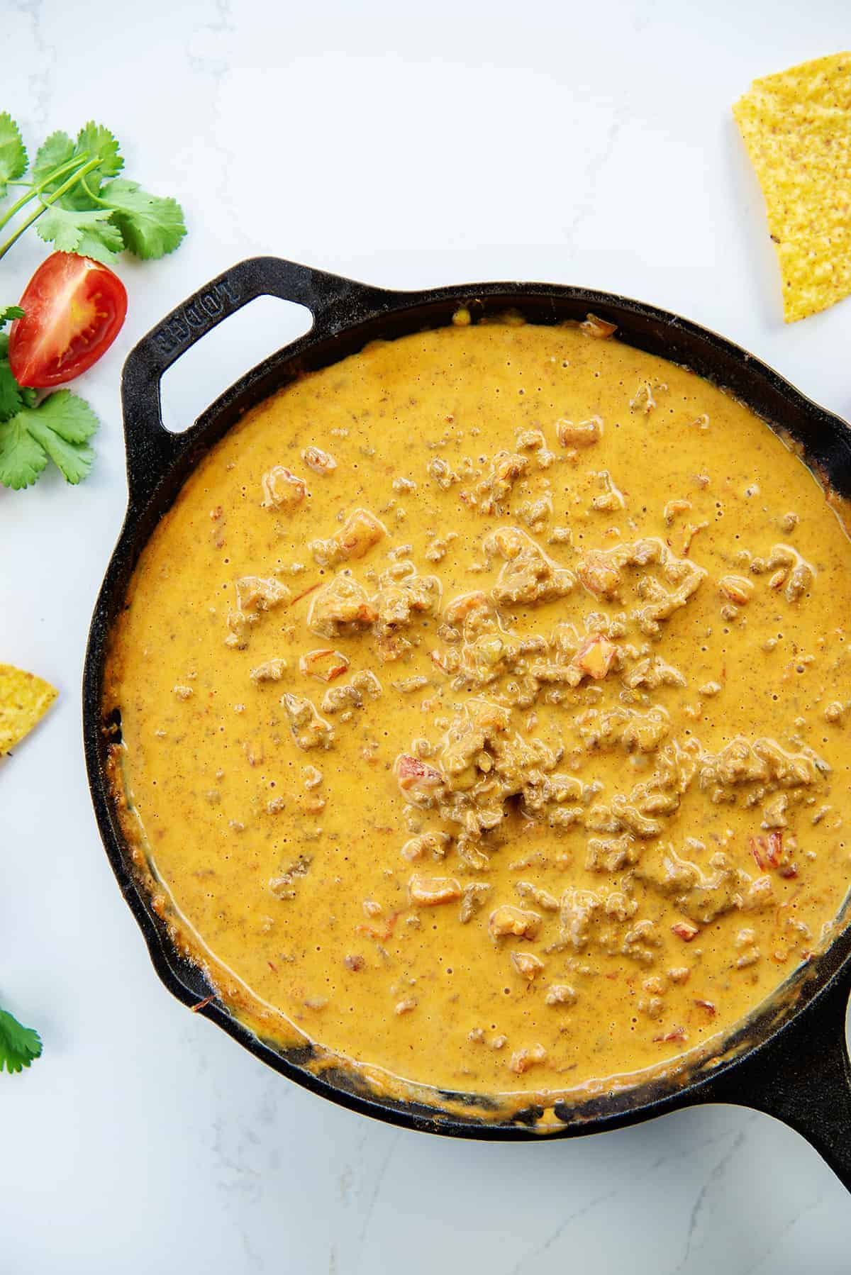 Rotel Cheese Dip recipe in cast iron skillet.