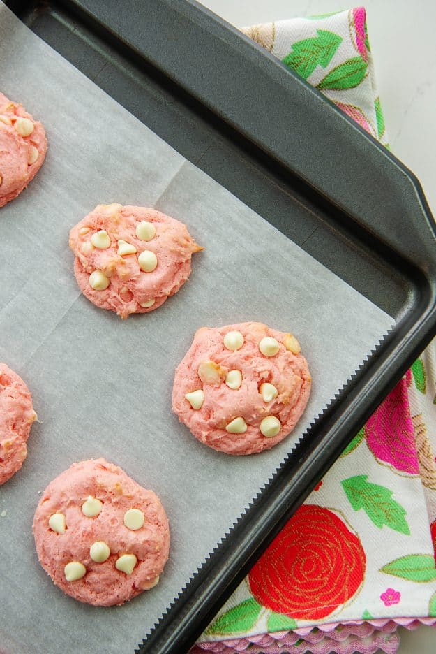 strawberry cake mix cookies on baking sheet.