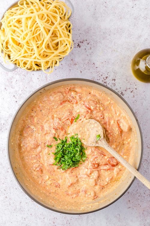 overhead view of feta pasta sauce in bowl.