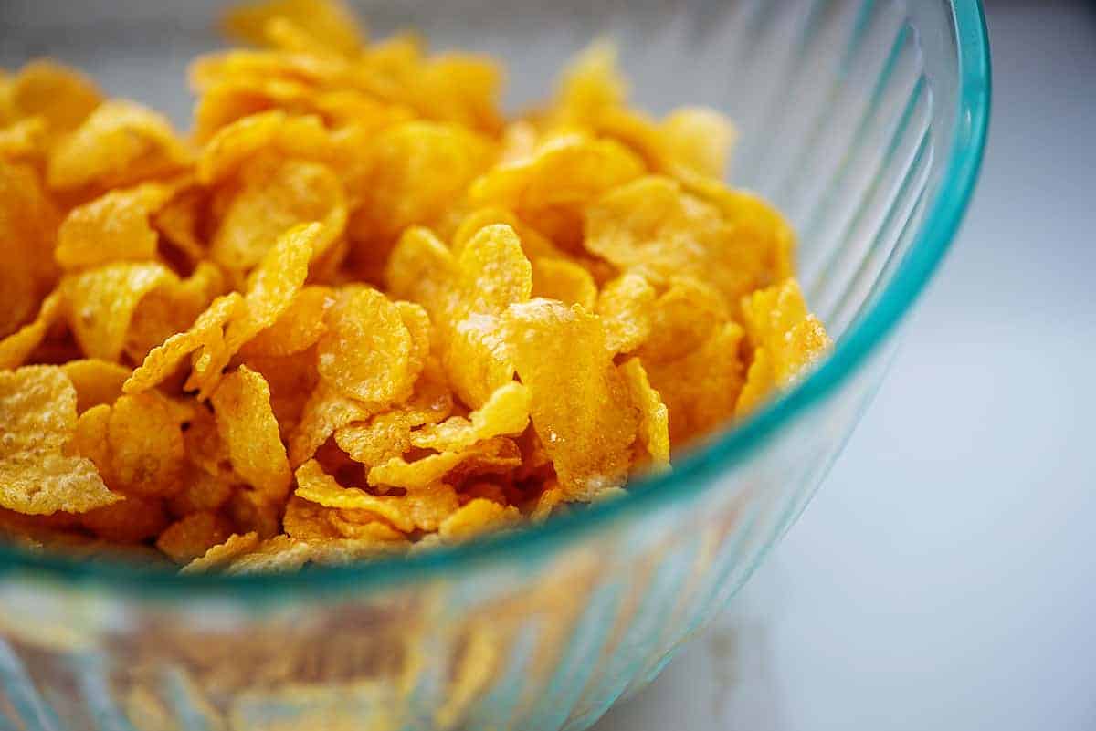cornflakes in glass mixing bowl.