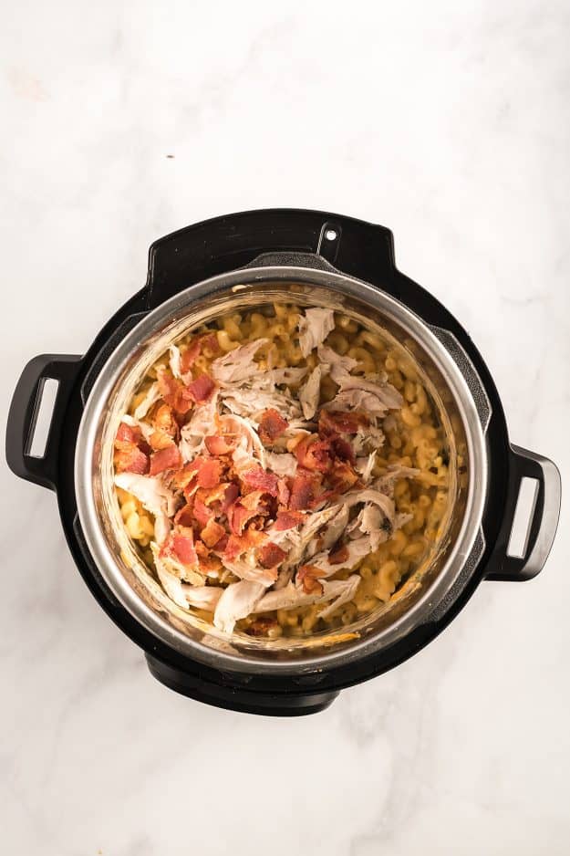 chicken and bacon in pressure cooker with macaroni and cheese.