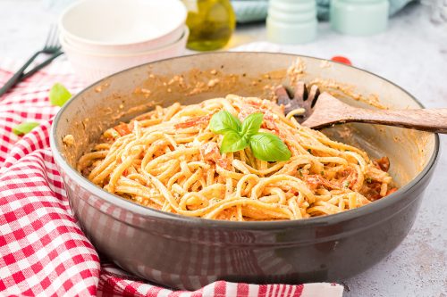 pasta recipe in brown bowl.