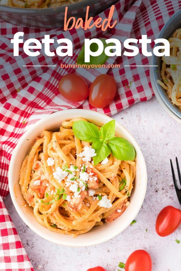feta pasta topped with cheese and basil in bowl.