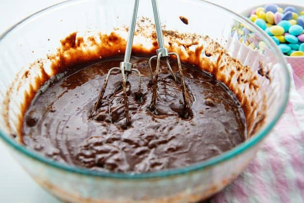 brownie batter in glass bowl.