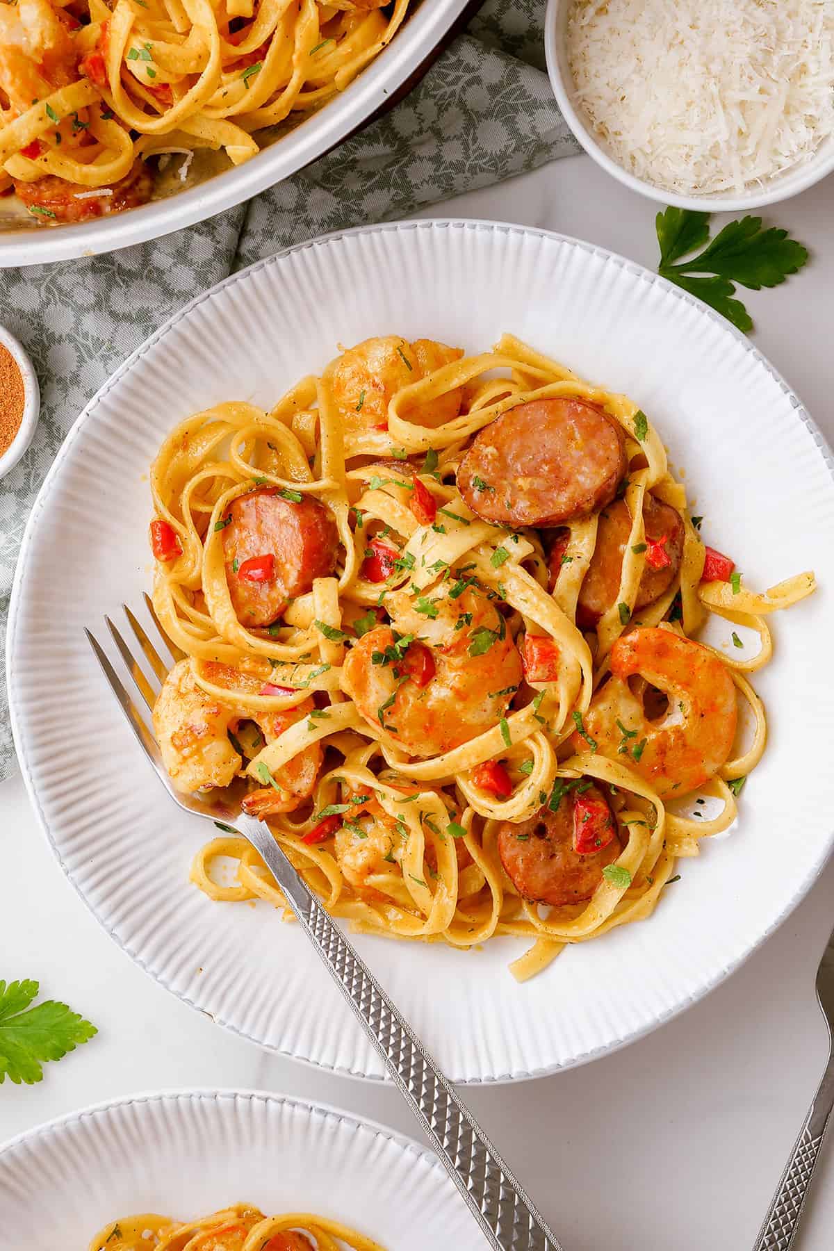 white plate loaded with cajun shrimp pasta recipe.