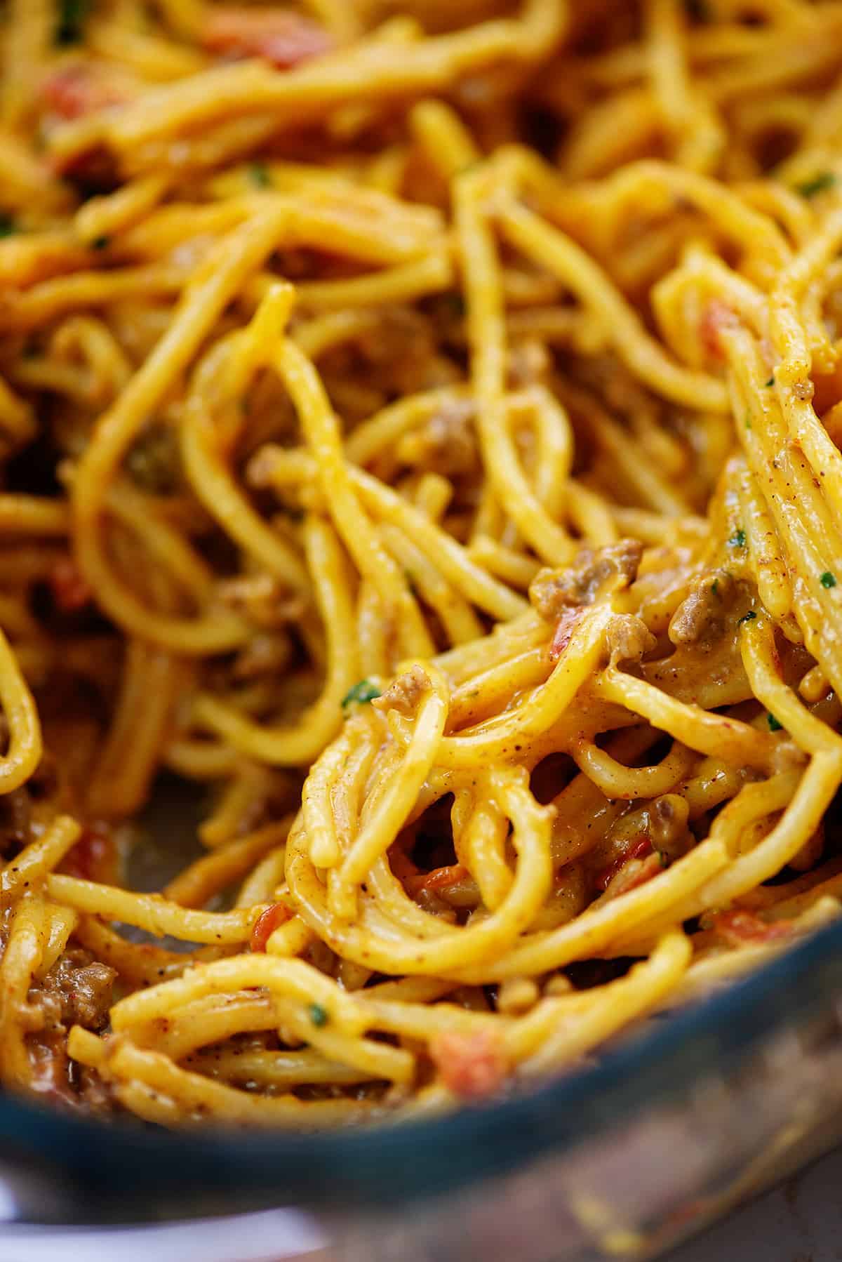 cheesy pasta in baking dish.