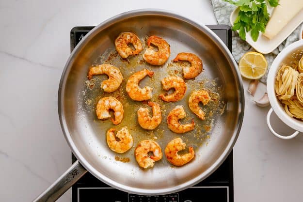 cooked shrimp in skillet.