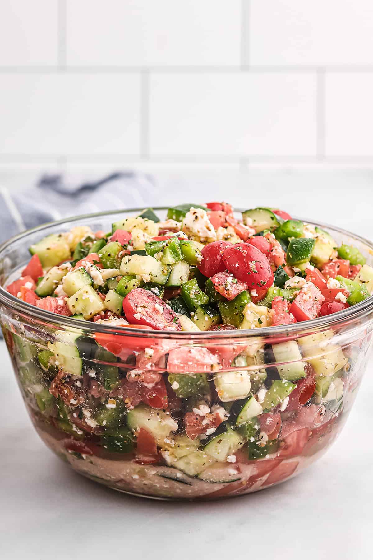 marinated vegetable salad in glass bowl.
