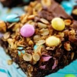 Easter Oatmeal Brownies on blue cake stand.