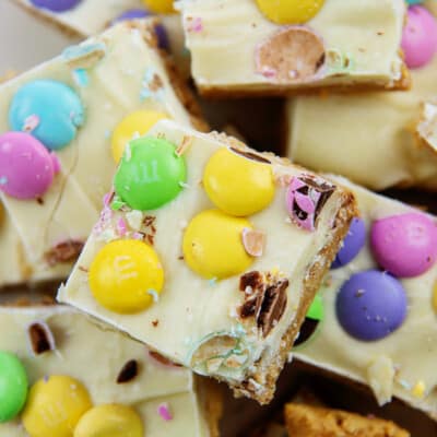 Pile of Easter no bake peanut butter bars.