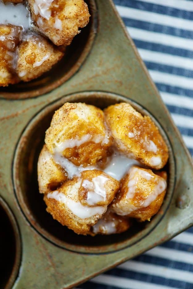 glazed monkey bread muffins in vintage muffin tin.