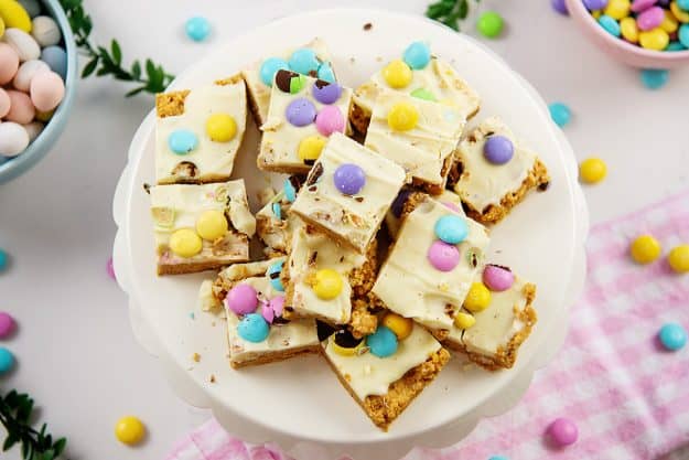 no bake bars piled on cake stand.