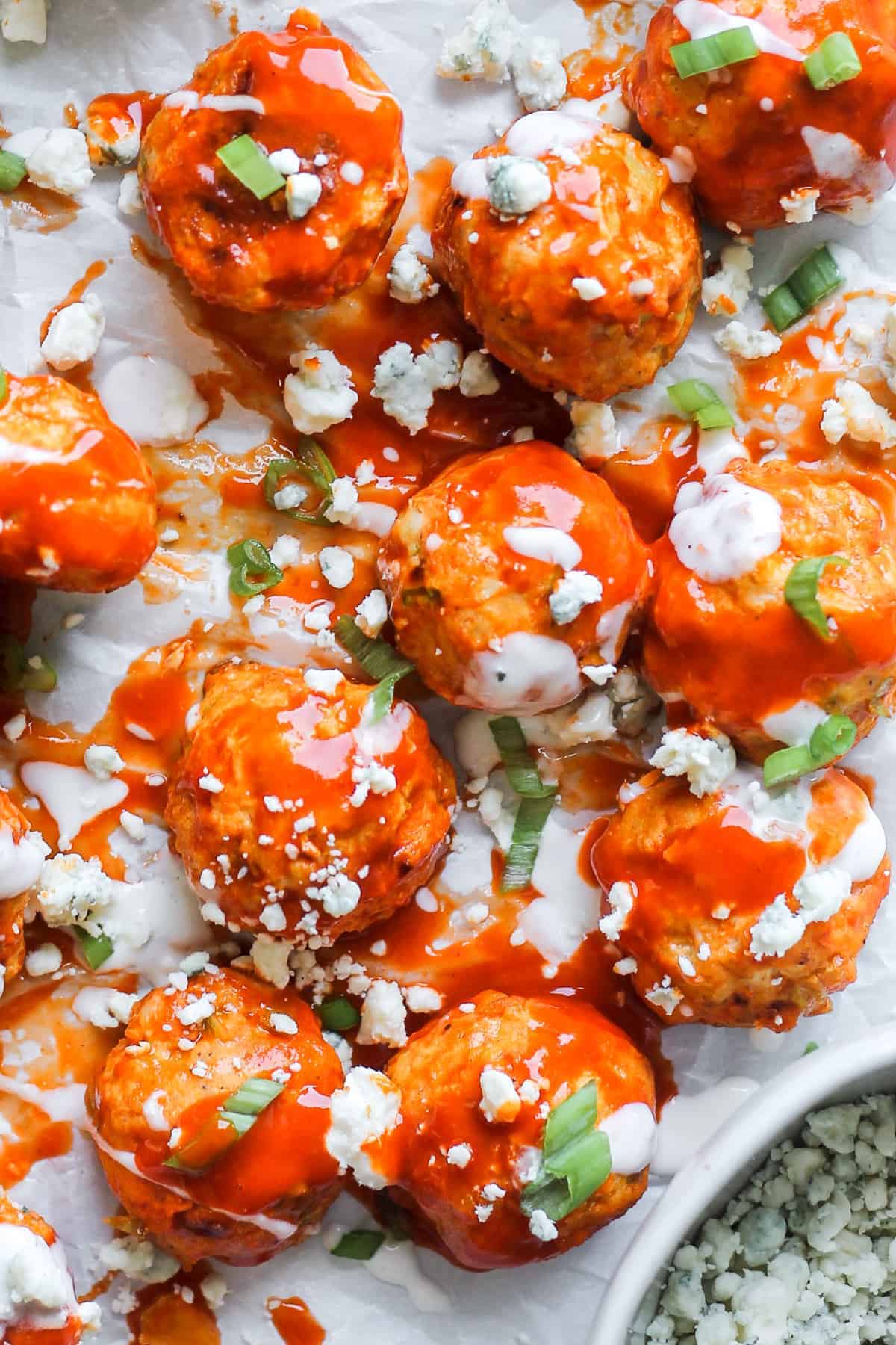 A top down close up view of buffalo chicken meatballs.